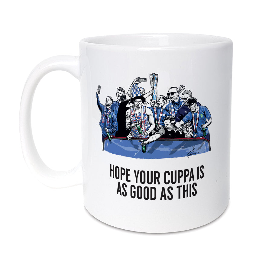 White 11oz mug featuring an illustration of Ipswich Town Football Club players celebrating their promotion to the Premier League with the text 'Hope your cuppa is as good as this'. designed by local lingo