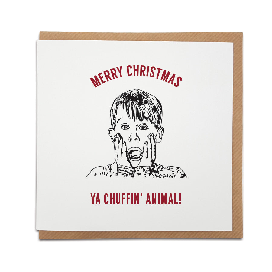 A Yorkshire twist on a Home Alone movie themed Christmas Card. A unique card, perfect for those fans of this iconic film (who happen to be from Yorkshire).  Card reads: Merry Christmas Ya Chiffin Animal (illustration of Kevin McCallister). Funny dialect card