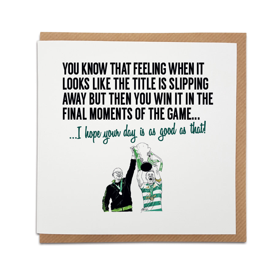 Square greeting card resting on a brown kraft envelope. Bold black text reads "YOU KNOW THAT FEELING WHEN IT LOOKS LIKE THE TITLE IS SLIPPING AWAY BUT THEN YOU WIN IT IN THE FINAL MOMENTS OF THE GAME..." followed by green text reading "...I hope your day is as good as that!". Below is a hand-drawn illustration of Martin O'Neill and McGregor lifting the league trophy. Celtic football birthday card, designed by Local Lingo.