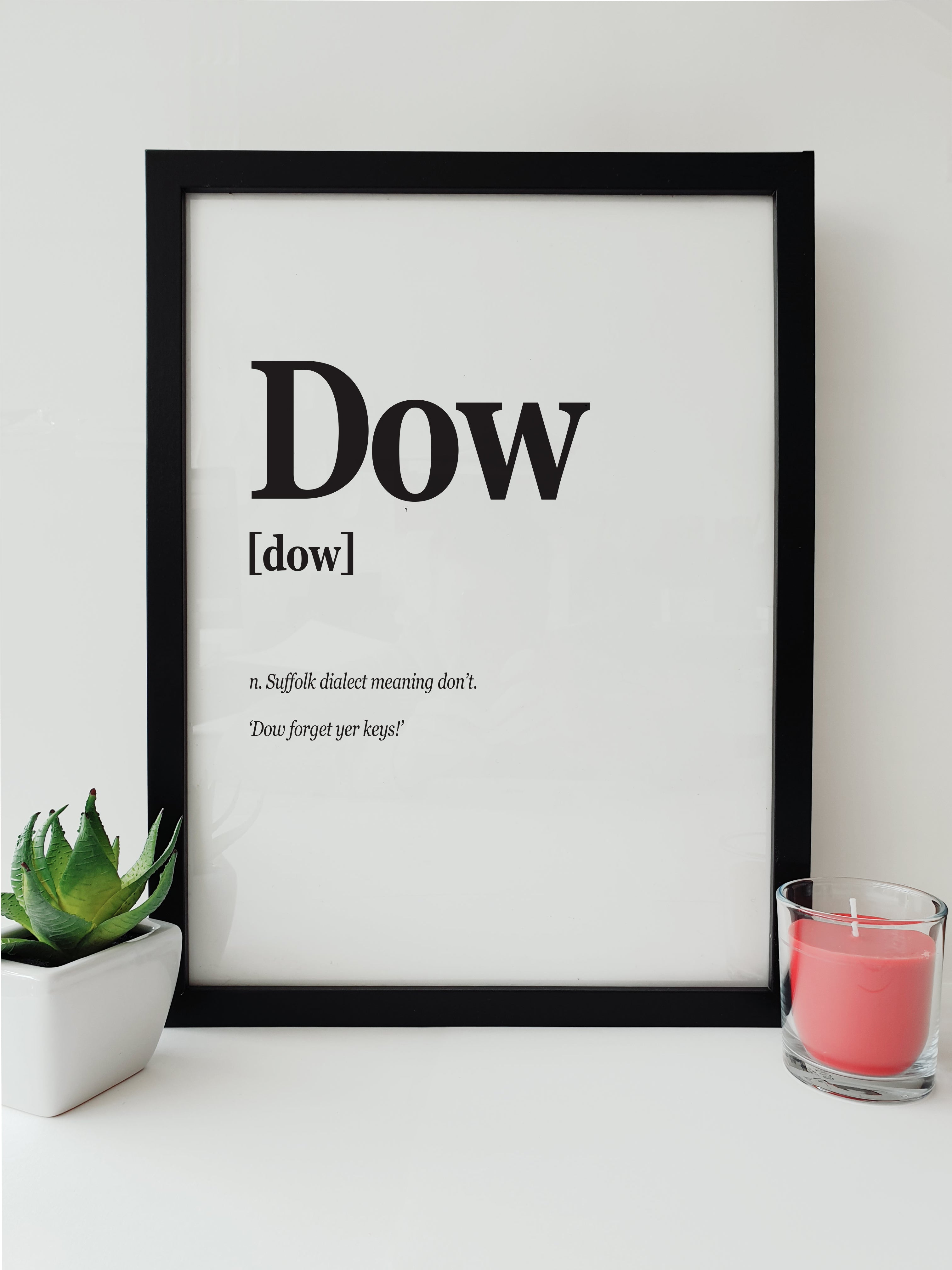 Art print featuring the word 'Dow' from Suffolk dialect, meaning don't, with the phrase 'Dow forget yer keys!' in a modern, minimalistic black and white design. Local Lingo