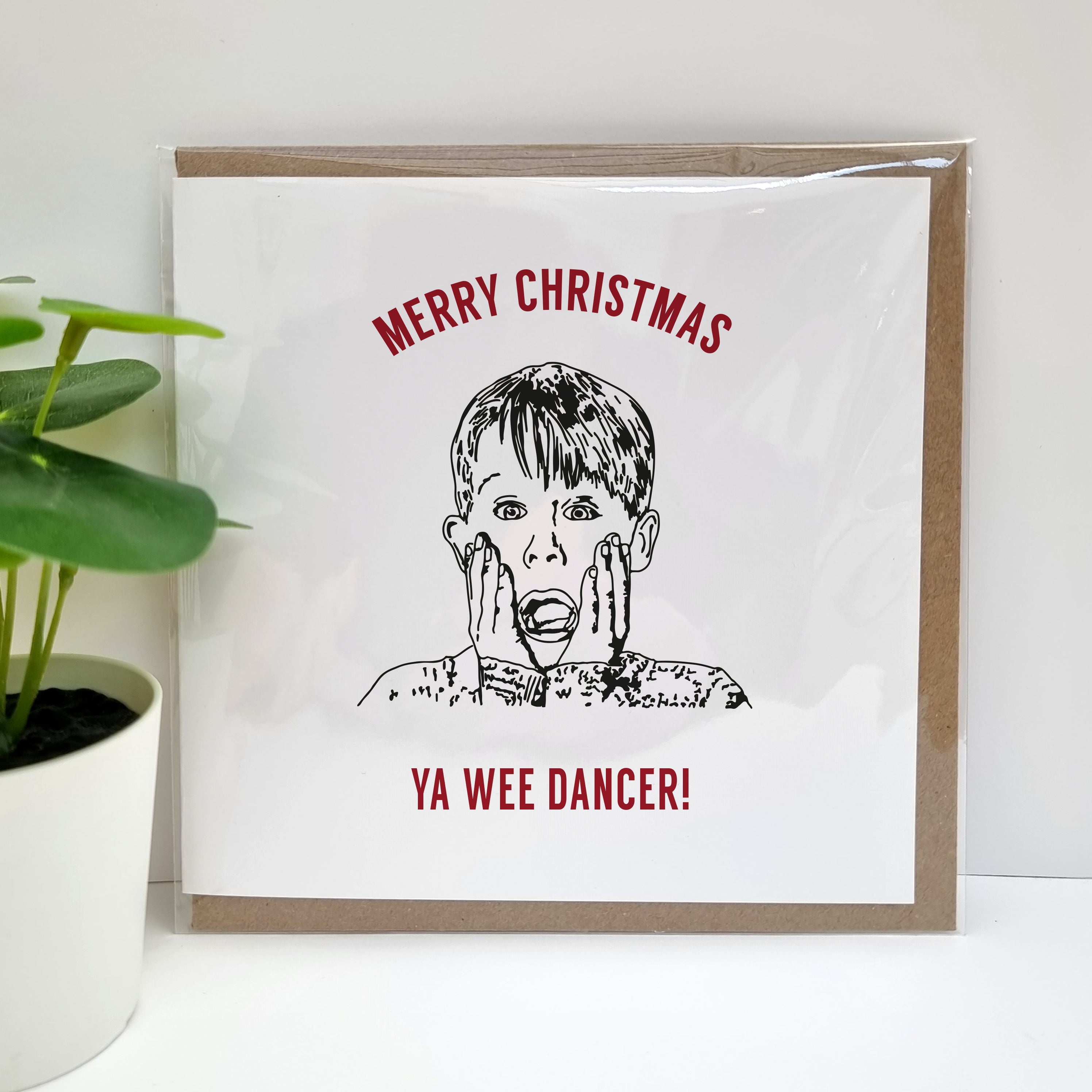 A Scottish twist on a Home Alone movie themed Christmas Card. A unique card, perfect for those fans of this iconic film (who happen to be from Scotland).  Card reads: Merry Christmas Ya Wee Dancer (illustration of Kevin McCallister)