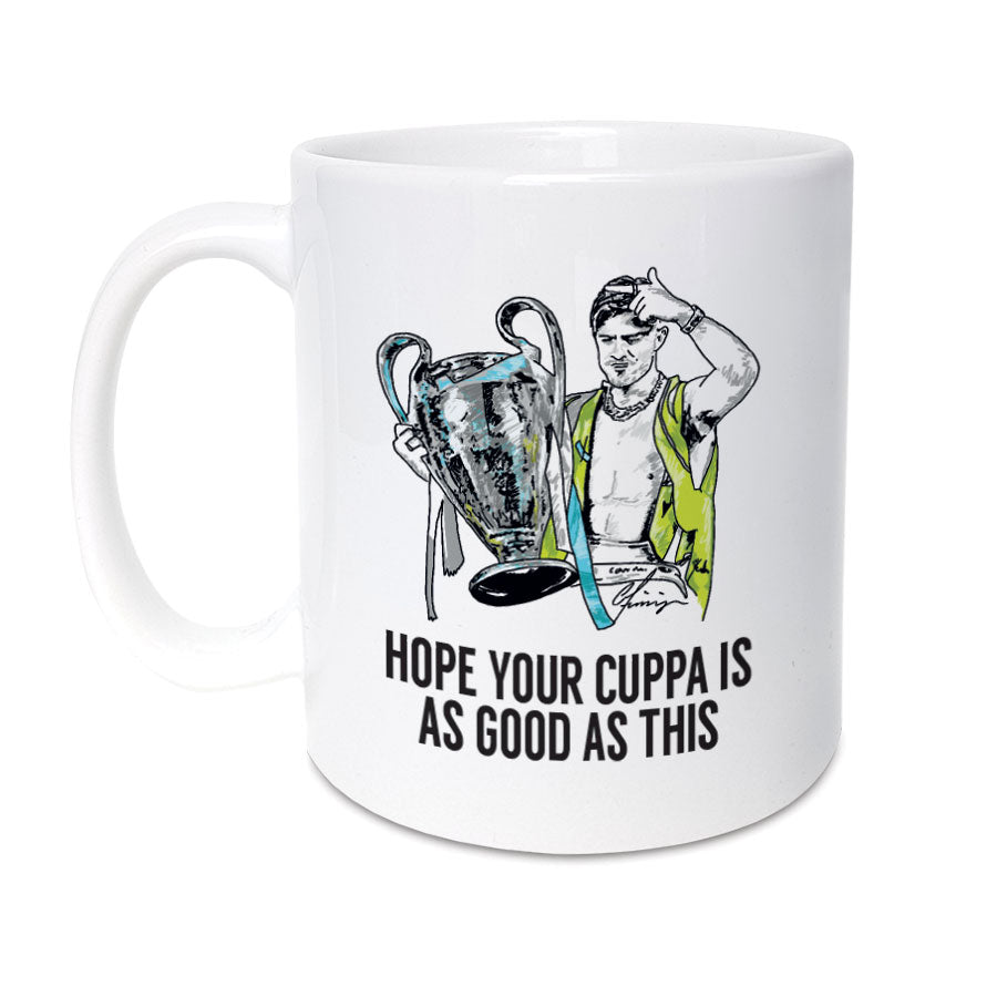 manchester city football club jack grealish themed coffee cup mug which reads hope your cuppa is as good as this and features an illustration of the player celebrating the treble and champions league victory, designed by local lingo