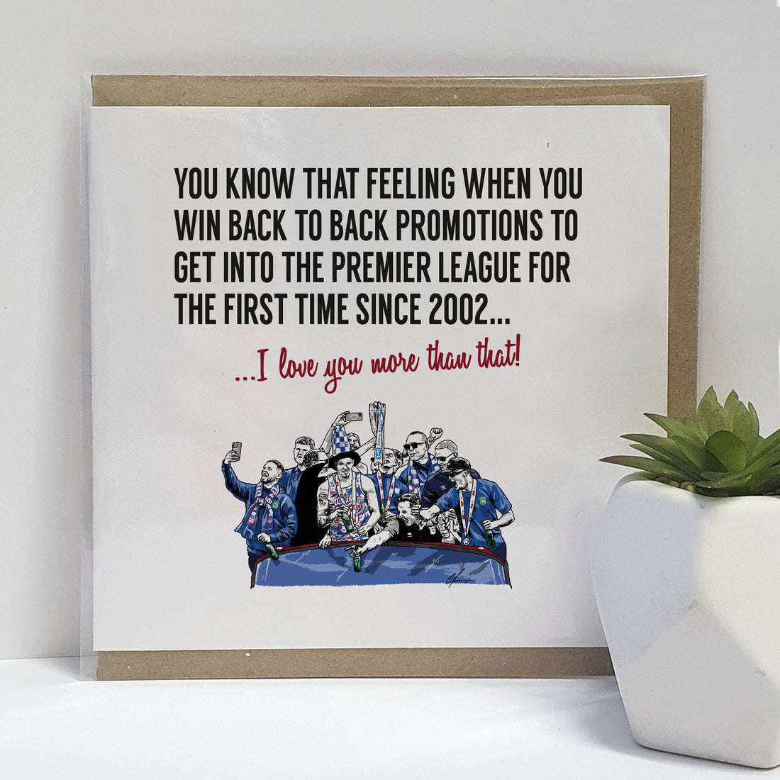 Ipswich Town football team on an open-top bus celebrating their Premier League promotion, with romantic text comparing the joy of their victory to love, designed by Local Lingo.