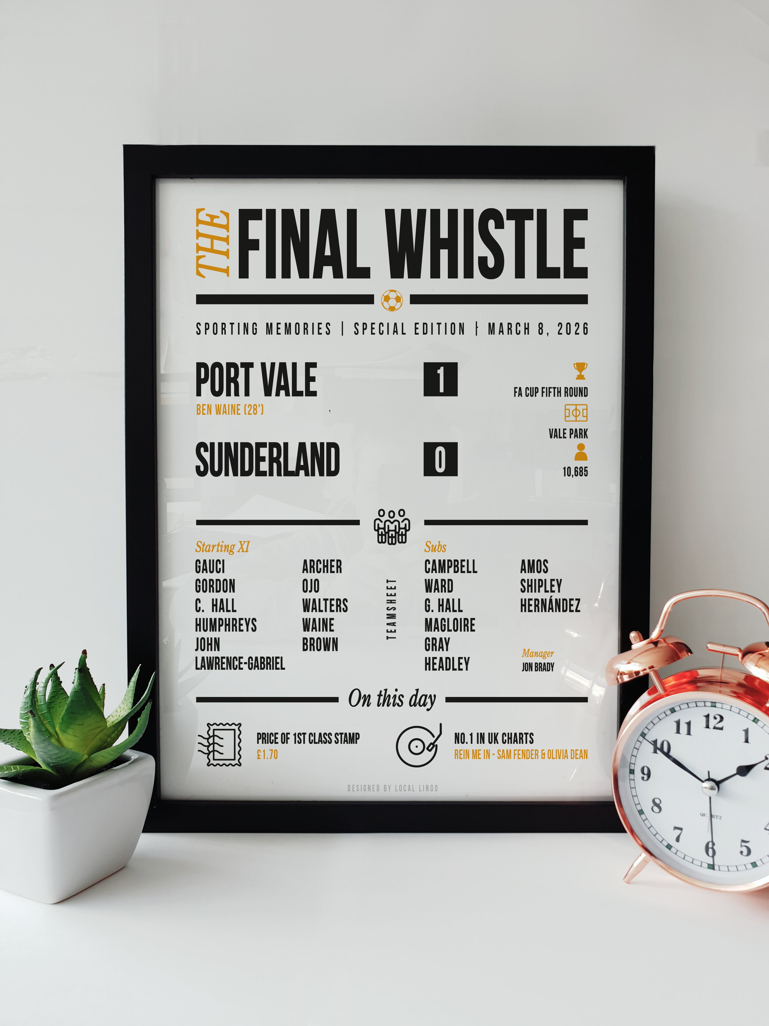 Framed "The Final Whistle" stats print celebrating Port Vale's 1-0 FA Cup victory over Sunderland on March 8, 2026. Features the scoreline, goalscorer Ben Waine (28'), starting XI, attendance of 10,685, and match trivia. Football match report art displayed next to a small plant and copper clock, designed by Local Lingo.
