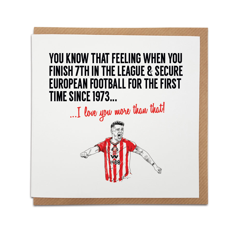 Square romantic greeting card resting on a brown kraft envelope. Bold black text reads "YOU KNOW THAT FEELING WHEN YOU FINISH 7TH IN THE LEAGUE & SECURE EUROPEAN FOOTBALL FOR THE FIRST TIME SINCE 1973..." followed by red text reading "...I love you more than that!". Below is a hand drawn illustration of Sunderland player Granit Xhaka passionately celebrating in his red and white striped kit. Sunderland football anniversary card designed by Local Lingo.