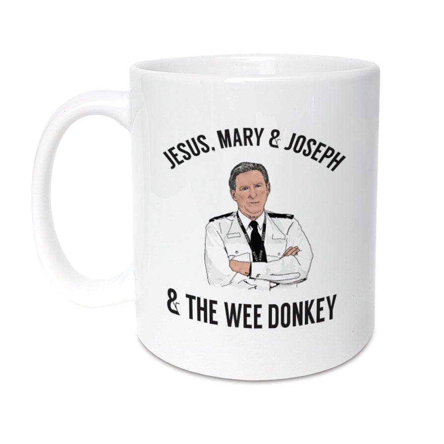 High Quality 11oz mug designed & made in the UK.  Inspired by popular TV show Line of Duty. A unique mug featuring hand drawn illustration of Ted Hastings featuring his famous quote 'Jesus, Mary & Joseph & the wee donkey'.   Mug reads: Jesus, Mary & Joseph & the wee donkey 