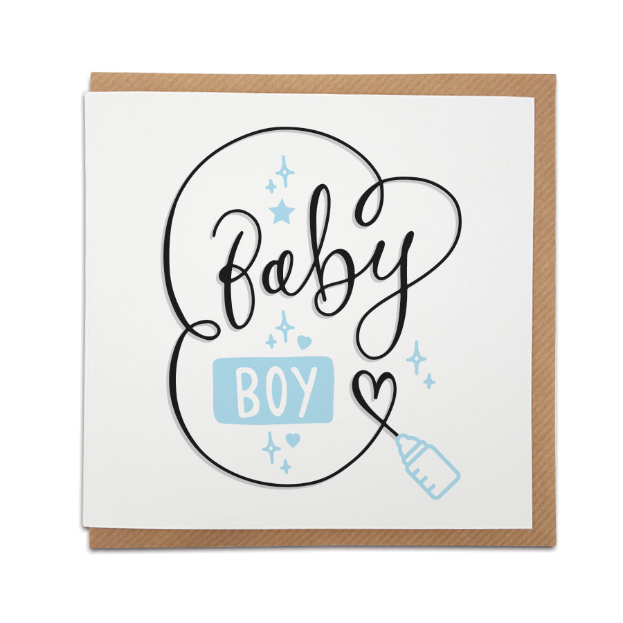 A handmade new baby card featuring 'baby boy' message in  handwriting style font. Perfect card to congratulate a friend or loved one on the arrival of their newborn.  Card reads: Baby Boy